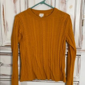 Yellow cable knit sweater